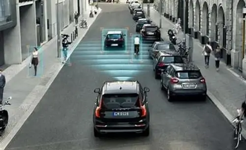 car on a busy street using sensors to locate nearby cars and pedestrians