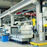 Image of a manufacturing facility with high-tech monitoring