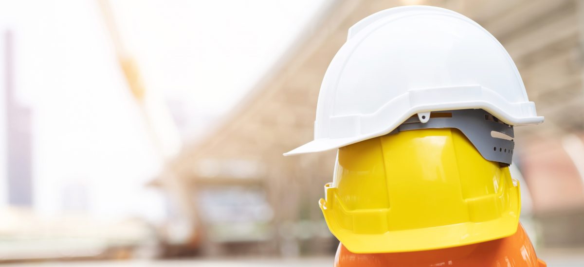 Safety Hardhats, indicating safety in manufacturing and construction