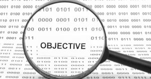 The word "Objective" clarified by a magnifying glass.