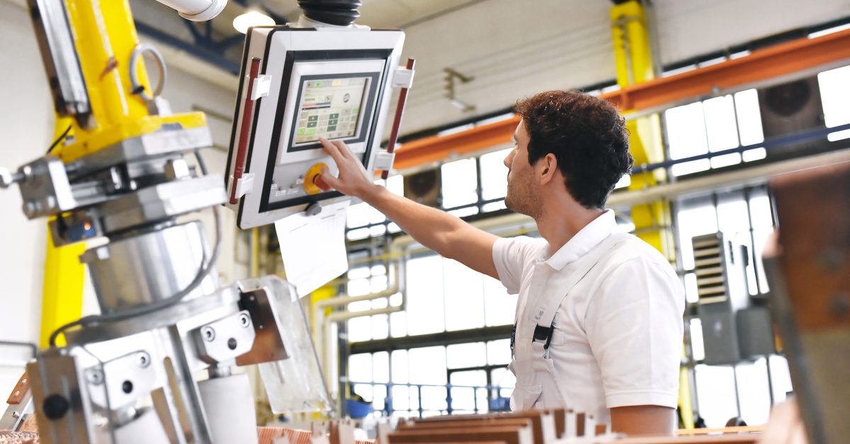 Student working in a manufacturing facility